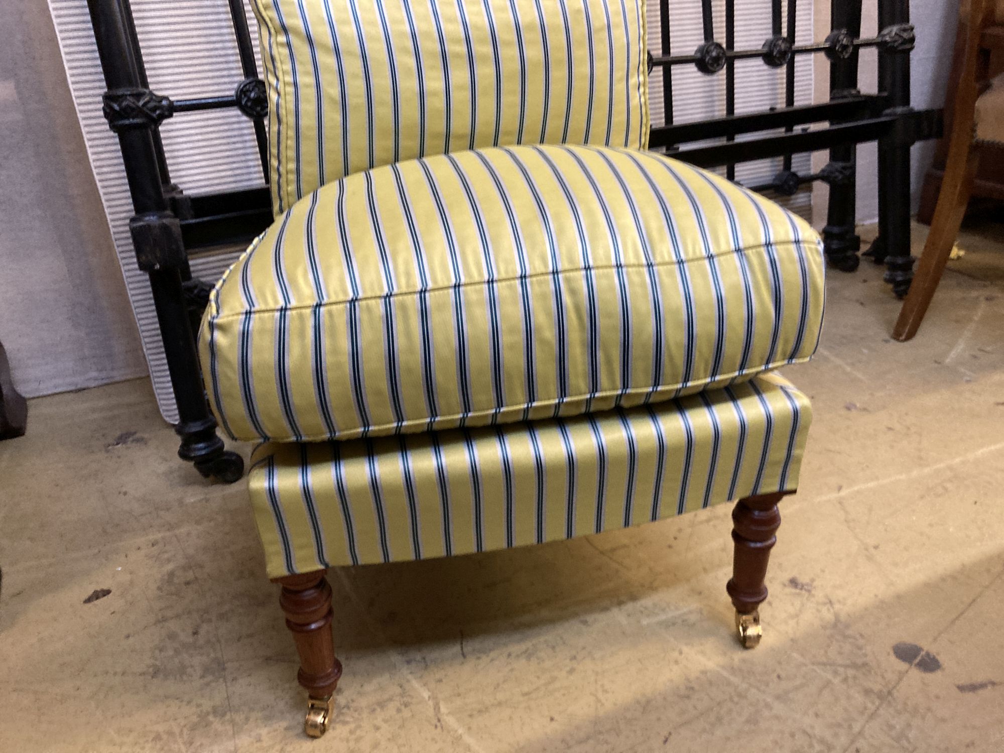 A modern Victorian style upholstered bedroom chair on turned tapered legs, width 50cm, depth 50cm, height 70cm